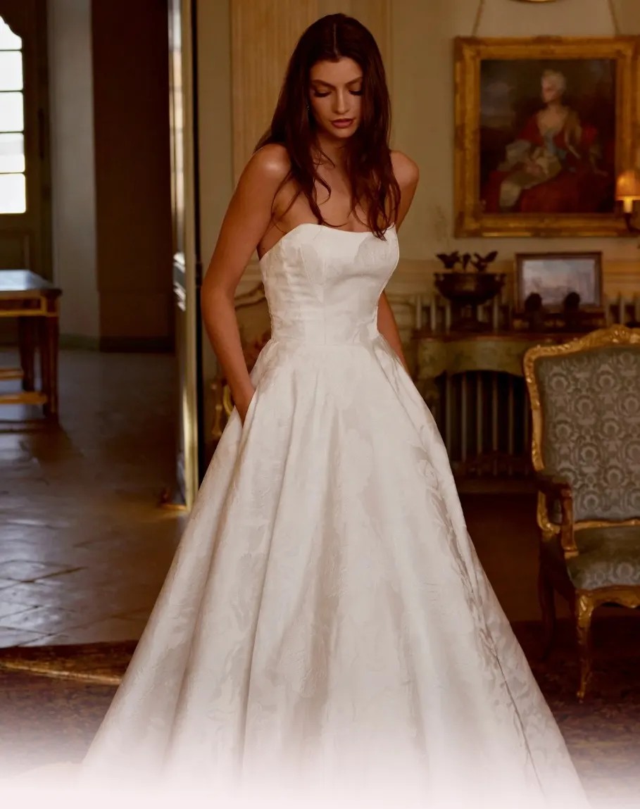 Brunette bride in Justin Alexander dress